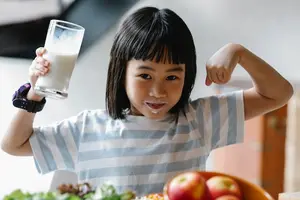 A girl drinking milk