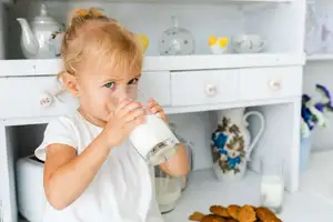 adorable little -girl drinking milk