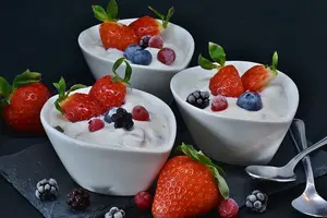 Lactose intolerance yogurt with fruits in a white bowl