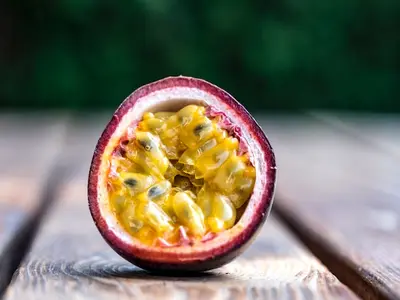 half cuteed Passion fruit kept wooden table