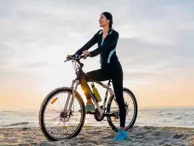Young woman riding bicycle for healthy lifestyle