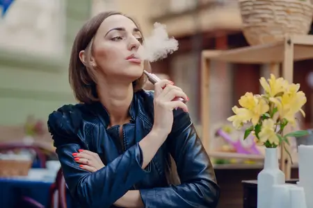 woman-enjoying-her-electronic-cigarette